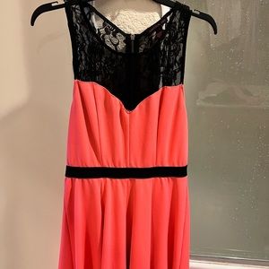 Material Girl black lace with dusty peach dress .